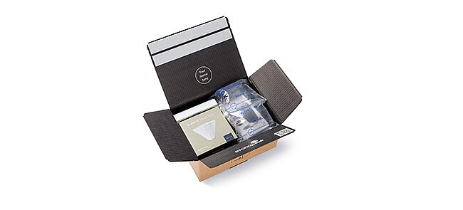 Protective packaging with air cushioning